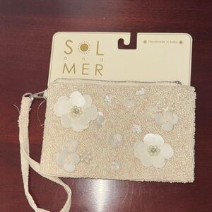 Sol and Mer Ivory Beaded Floral Wristlet Clutch